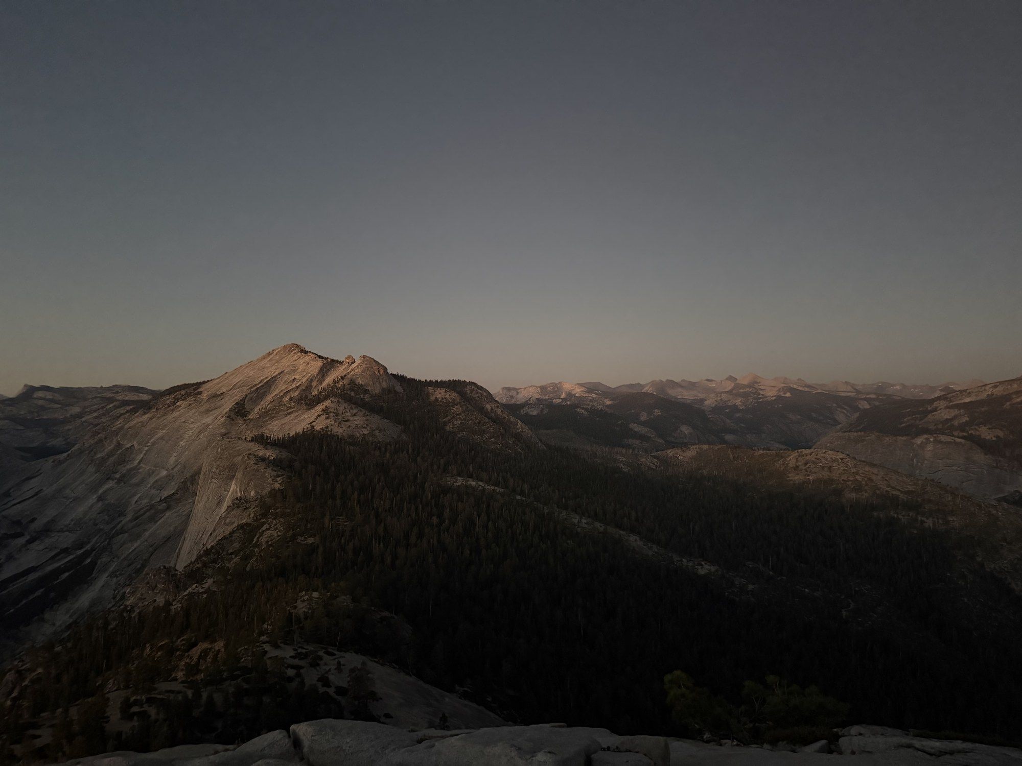 Yosemite Valley at dusk from Tunnel View, granite walls fading into blue haze