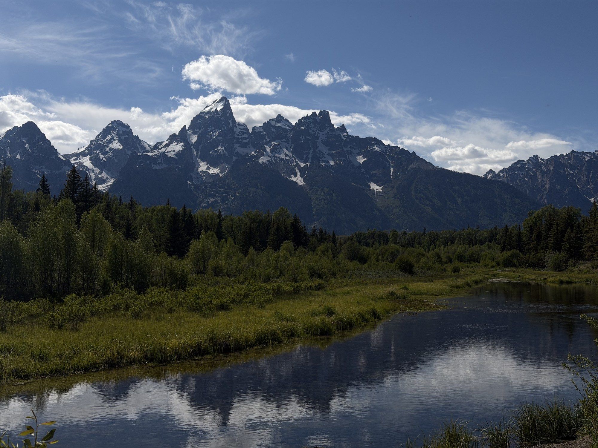 The Teton range reflected in the Snake River at Schwabacher Landing