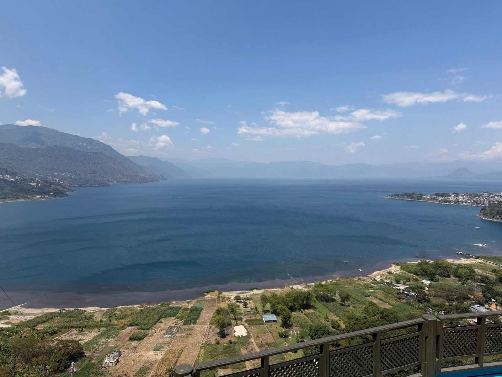 Villages and blue mountains surrounding Lake Atitlan