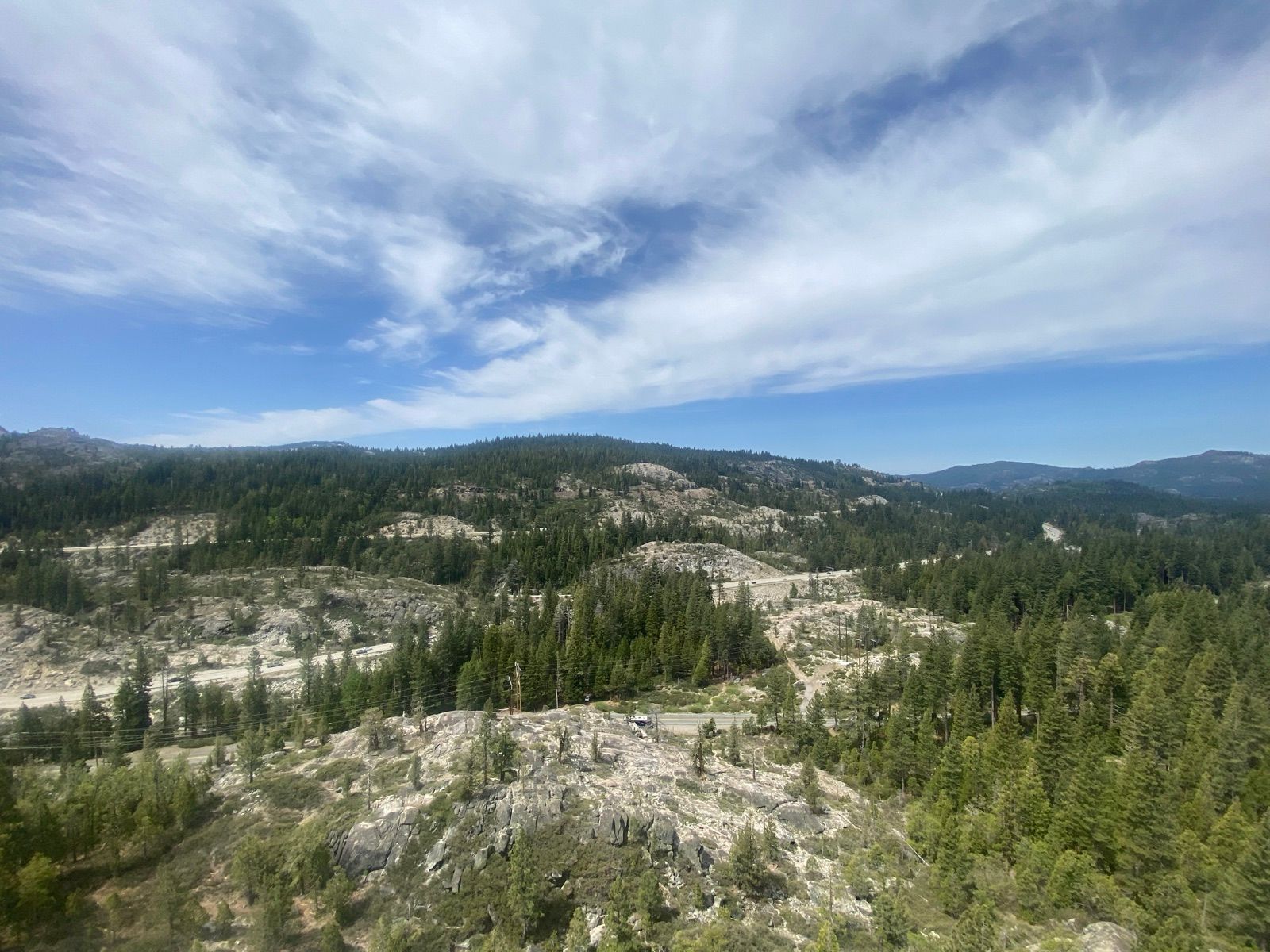 Granite ridges and pine forest stretching across the Tahoe basin